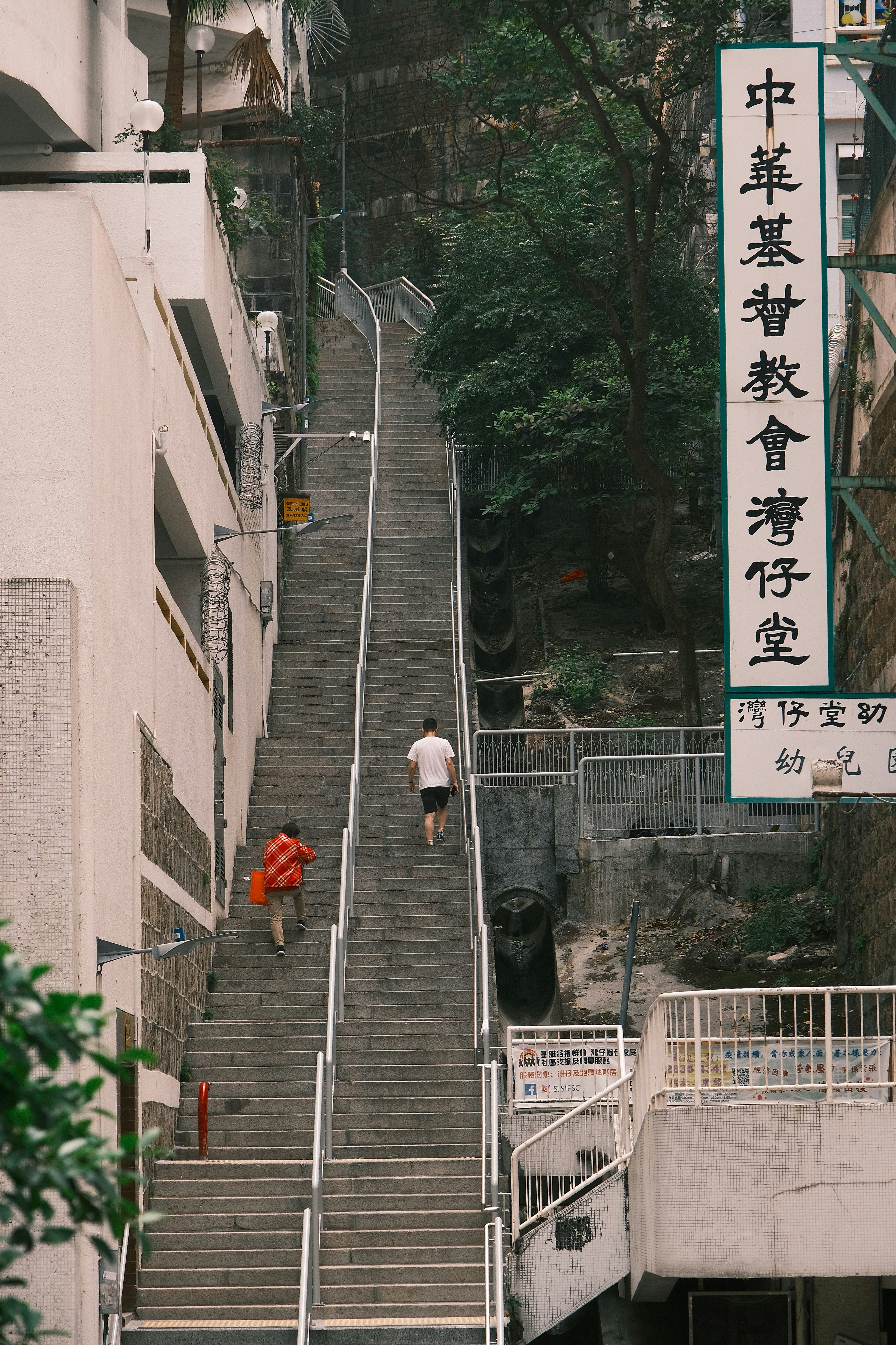 a man walking down a set of stairs
