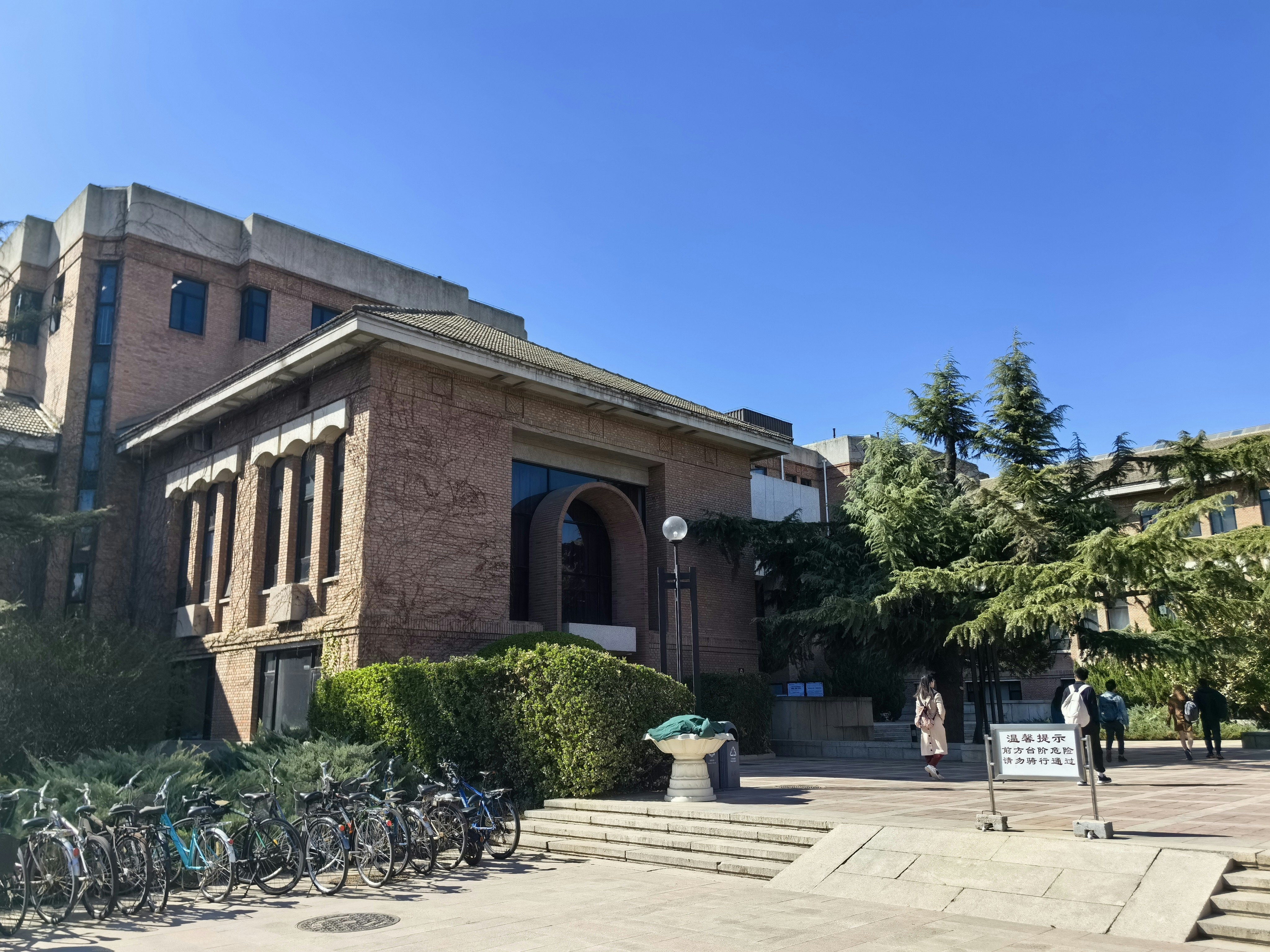 a group of bikes parked in front of a building