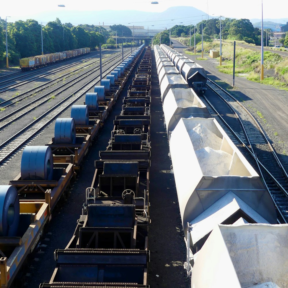 a train yard filled with lots of train cars