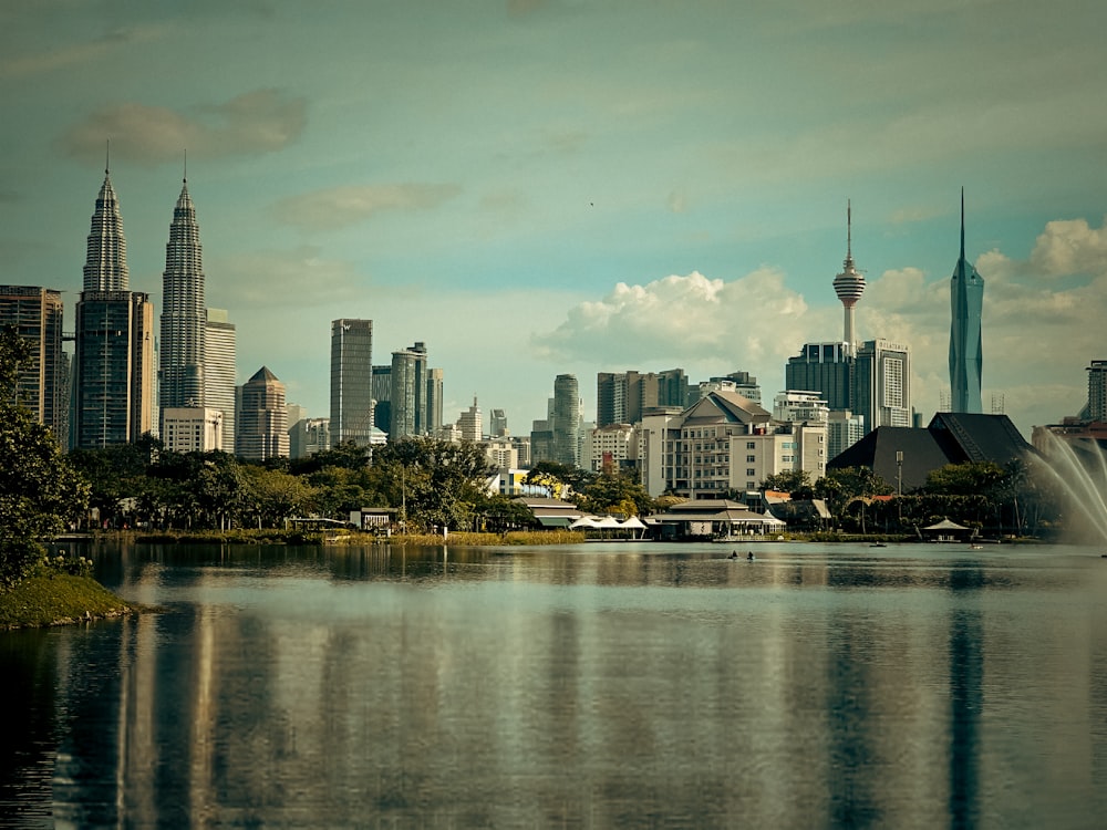 a large body of water with a city in the background