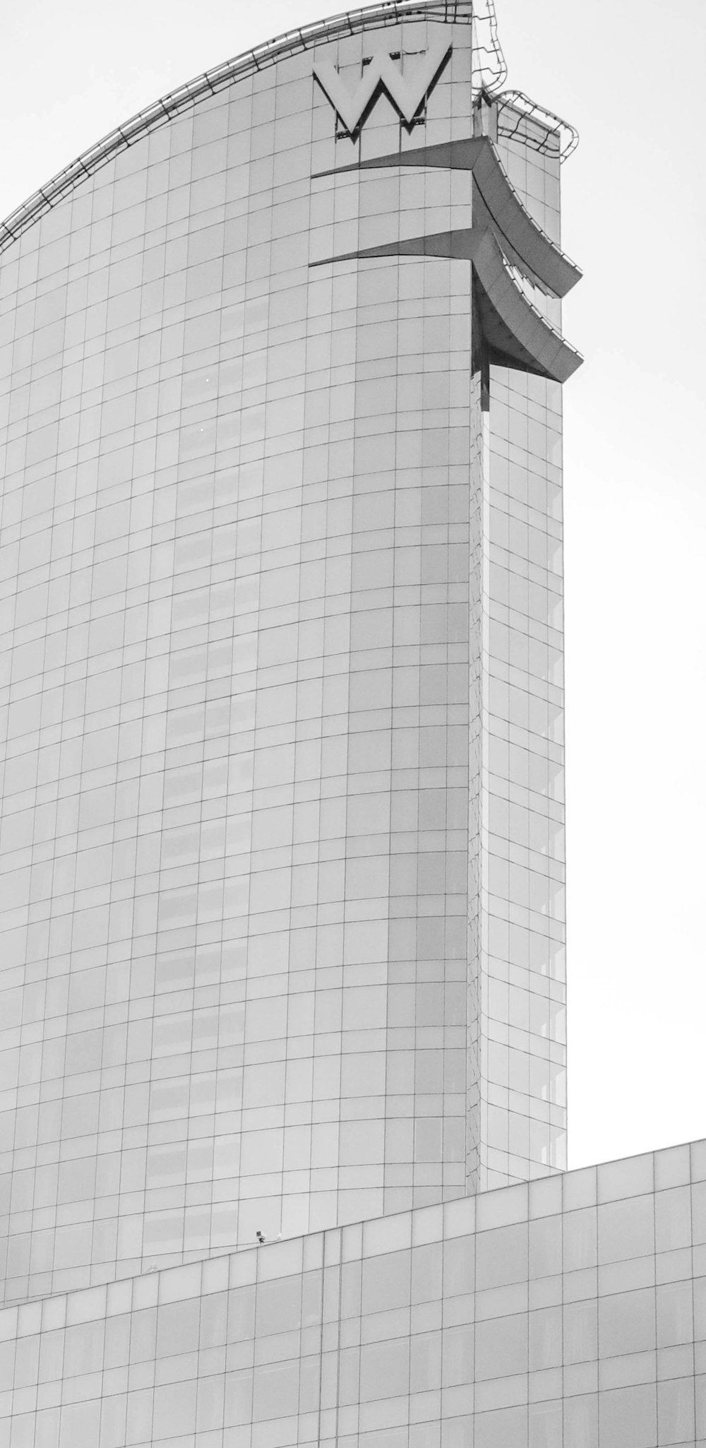 a black and white photo of a tall building