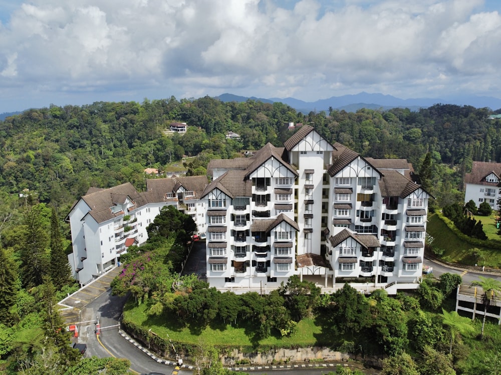 an aerial view of a large white building