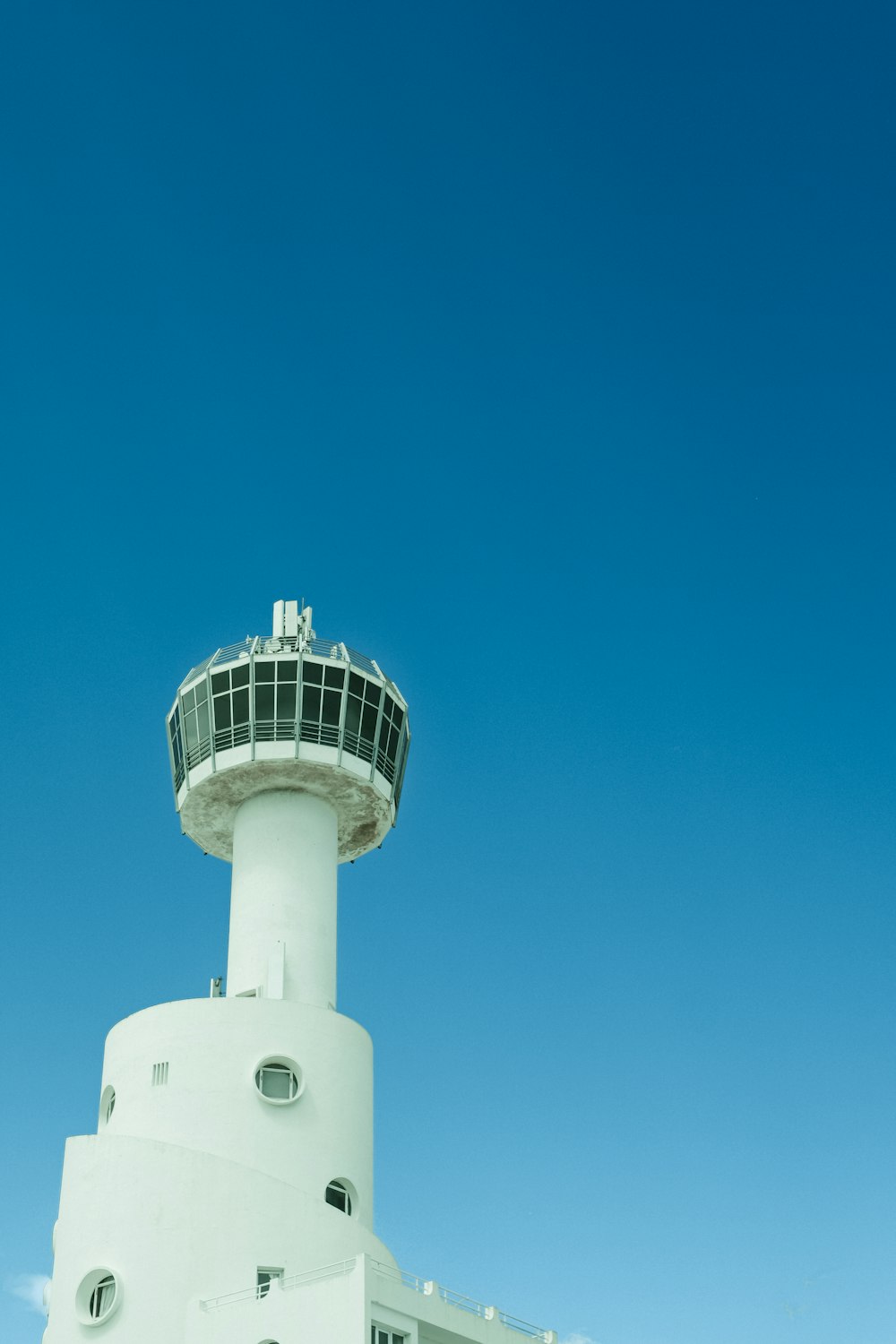 a large white building with a tower on top of it