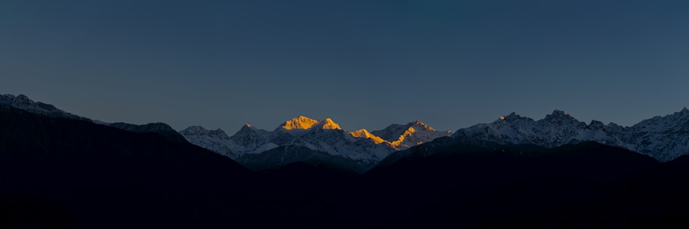 a view of a mountain range at night