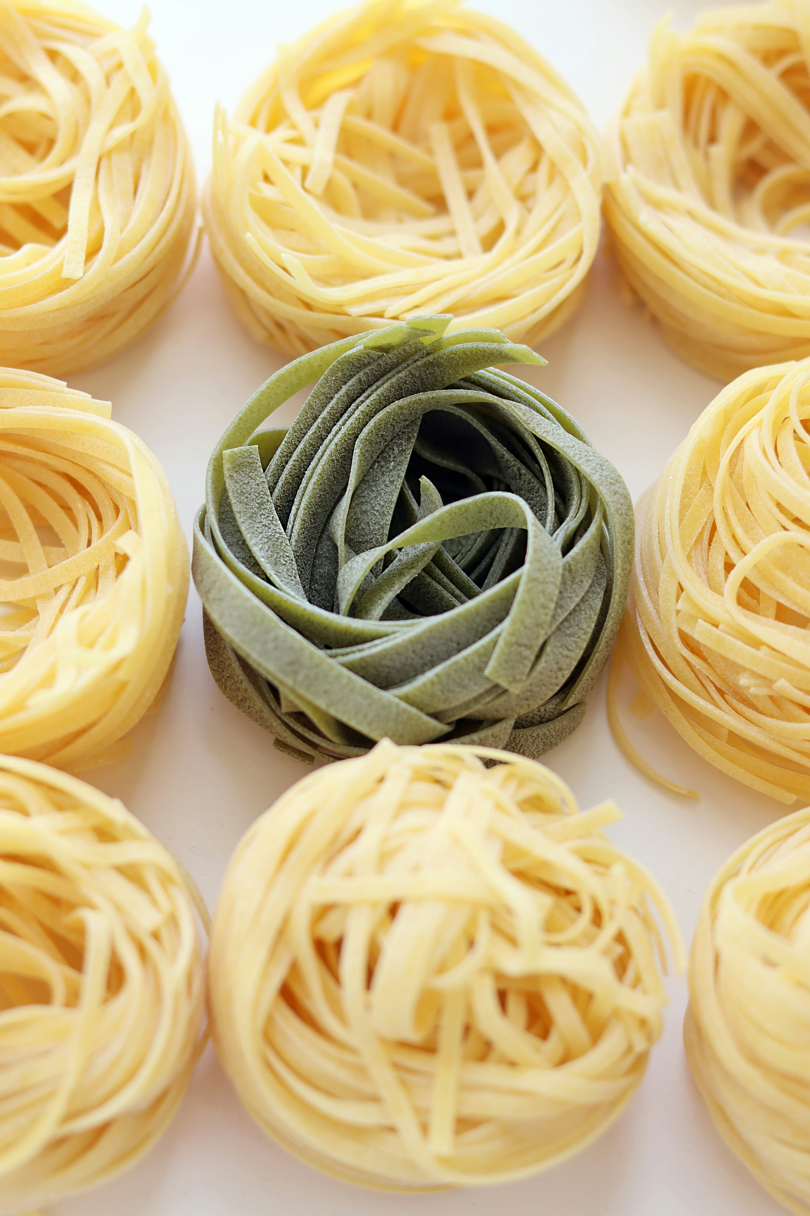 a bunch of different types of pasta on a table