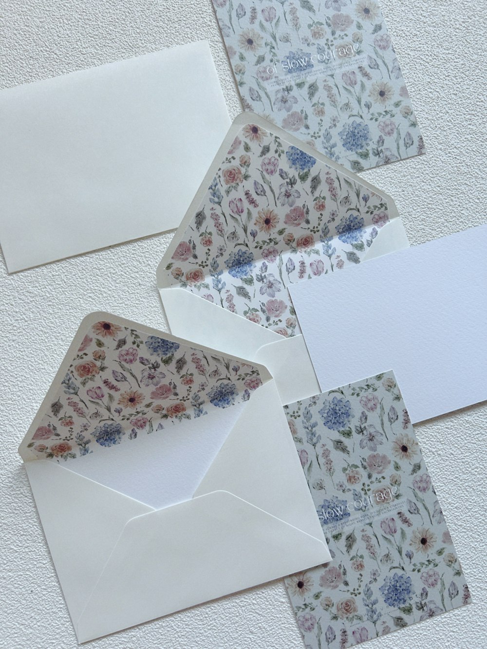 a group of envelopes sitting on top of a table