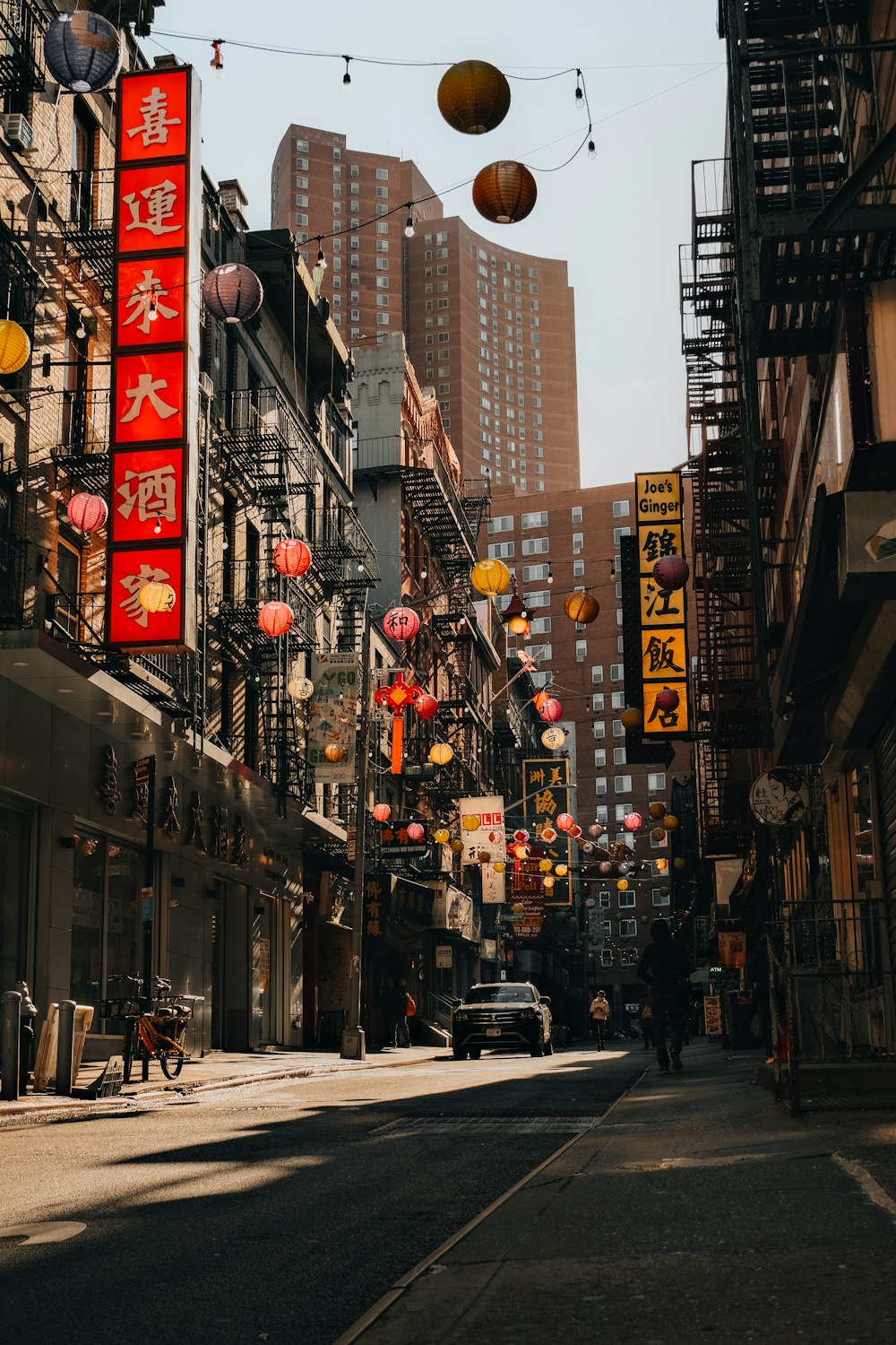 a city street filled with lots of tall buildings