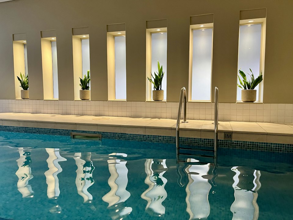 A bright indoor lap pool for a relaxed spa morning before checkout