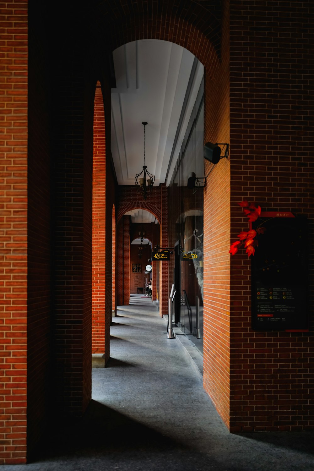 a long hallway with a clock on the wall