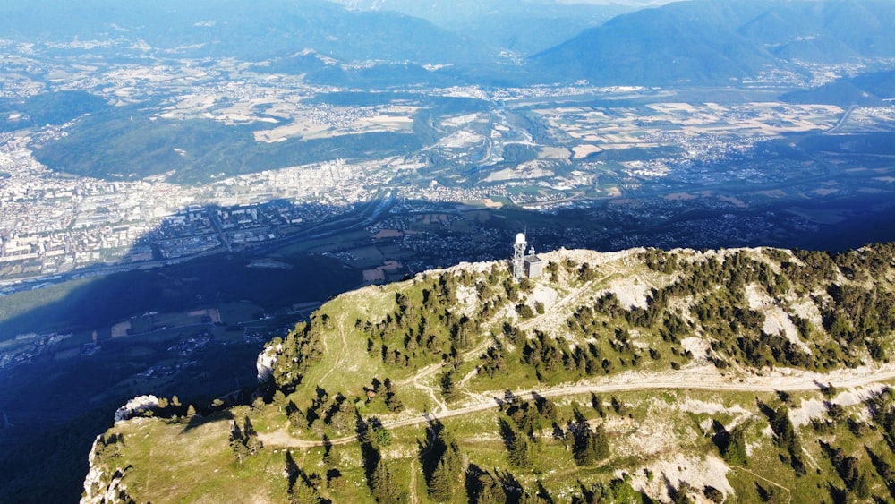 an aerial view of a city and a mountain