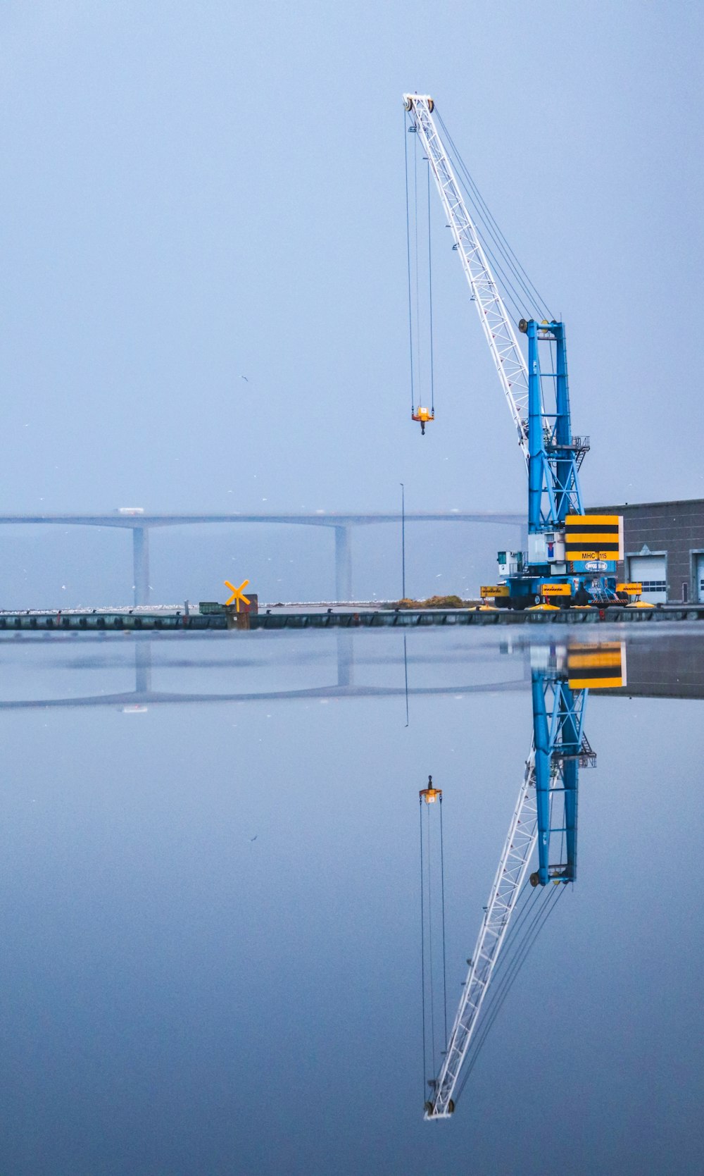 a crane that is sitting in the water