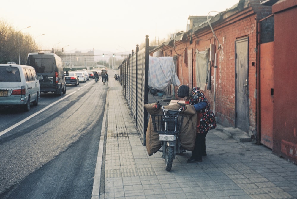 a person on a bike on a city street