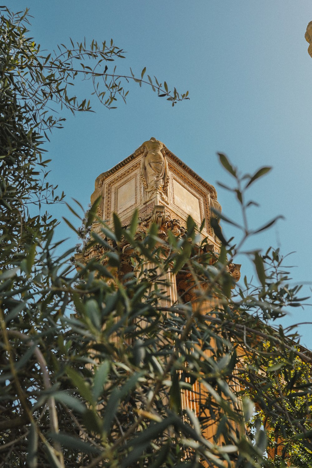 a building with a clock on the top of it