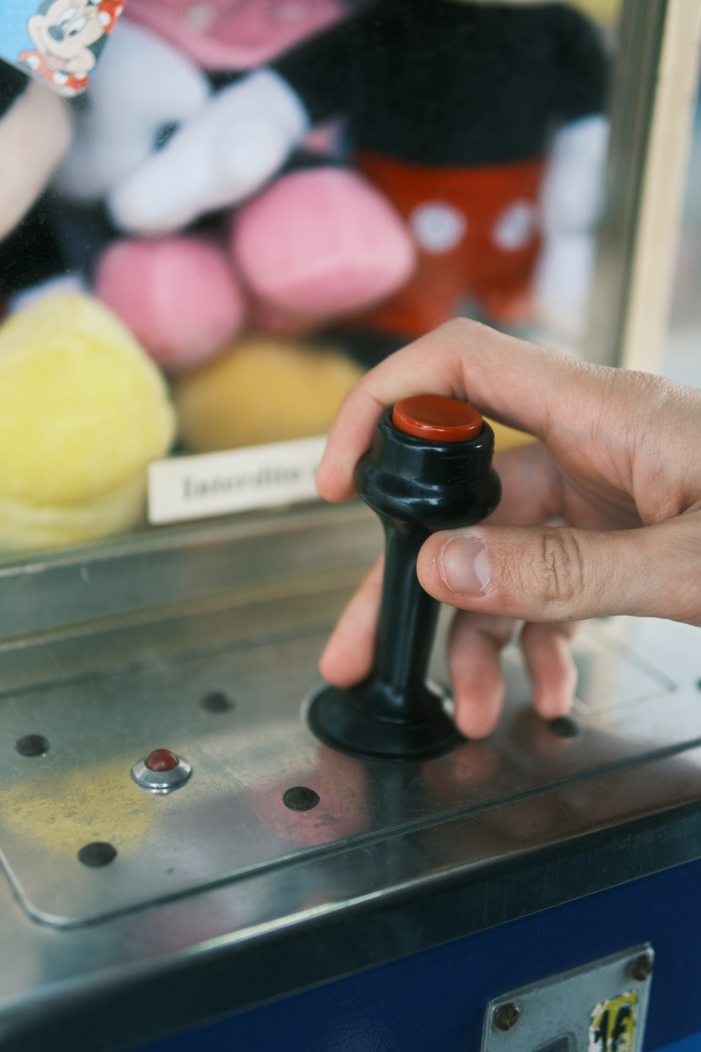 a person is pressing a button on a machine