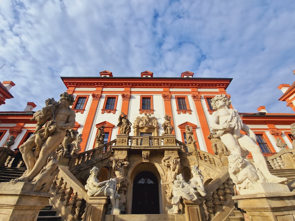 a building with statues on the front of it