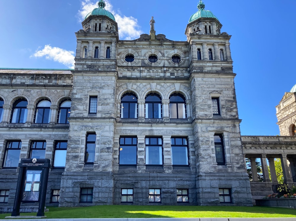 a large stone building with a clock tower