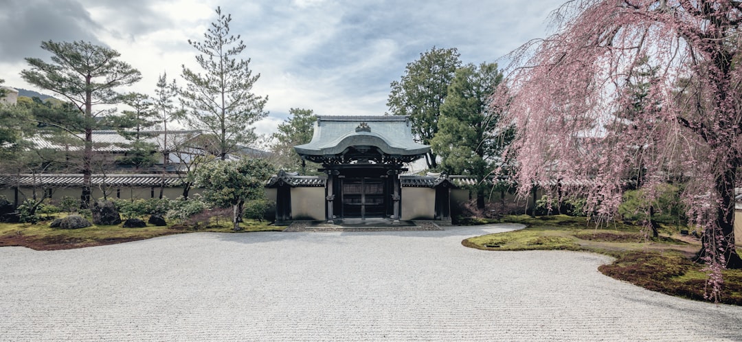 a building with a gate in the middle of it,