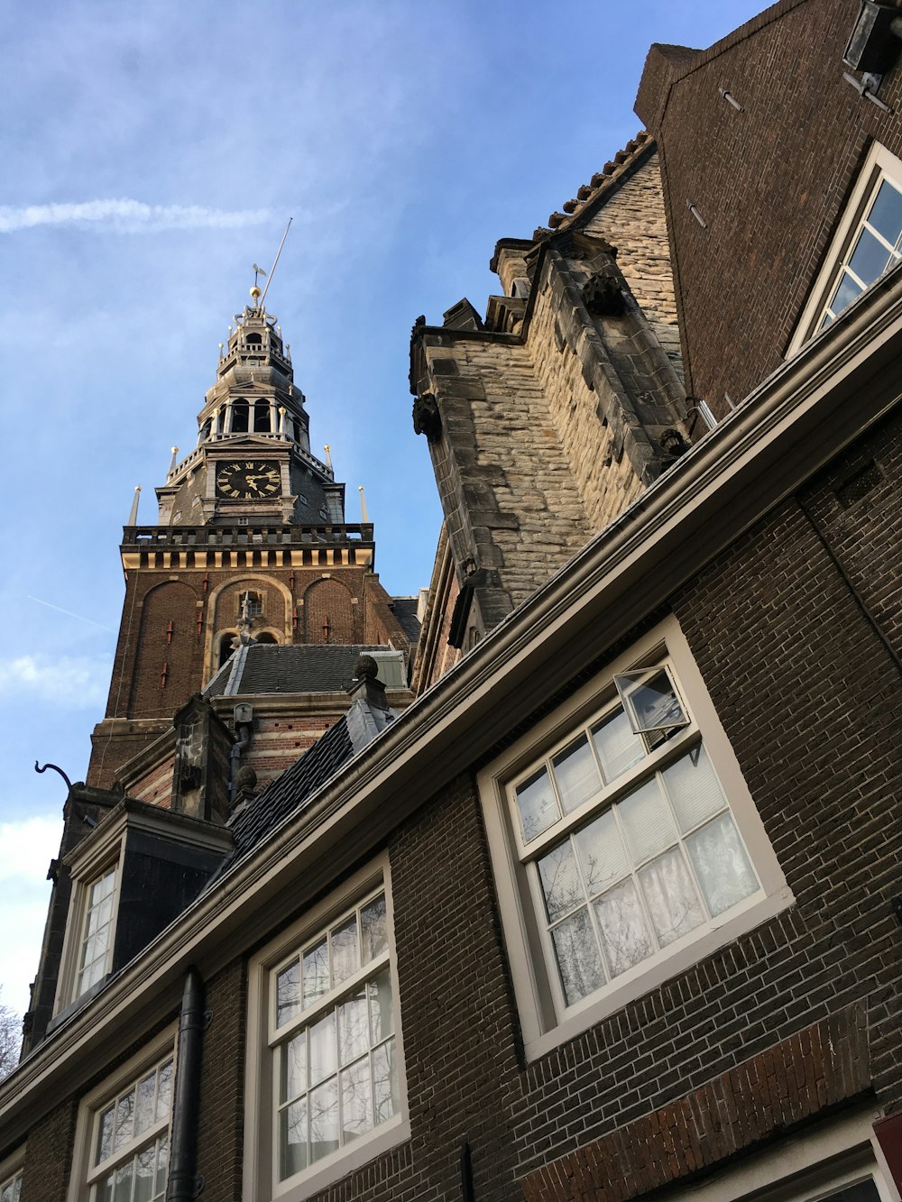 a tall building with a clock on the top of it