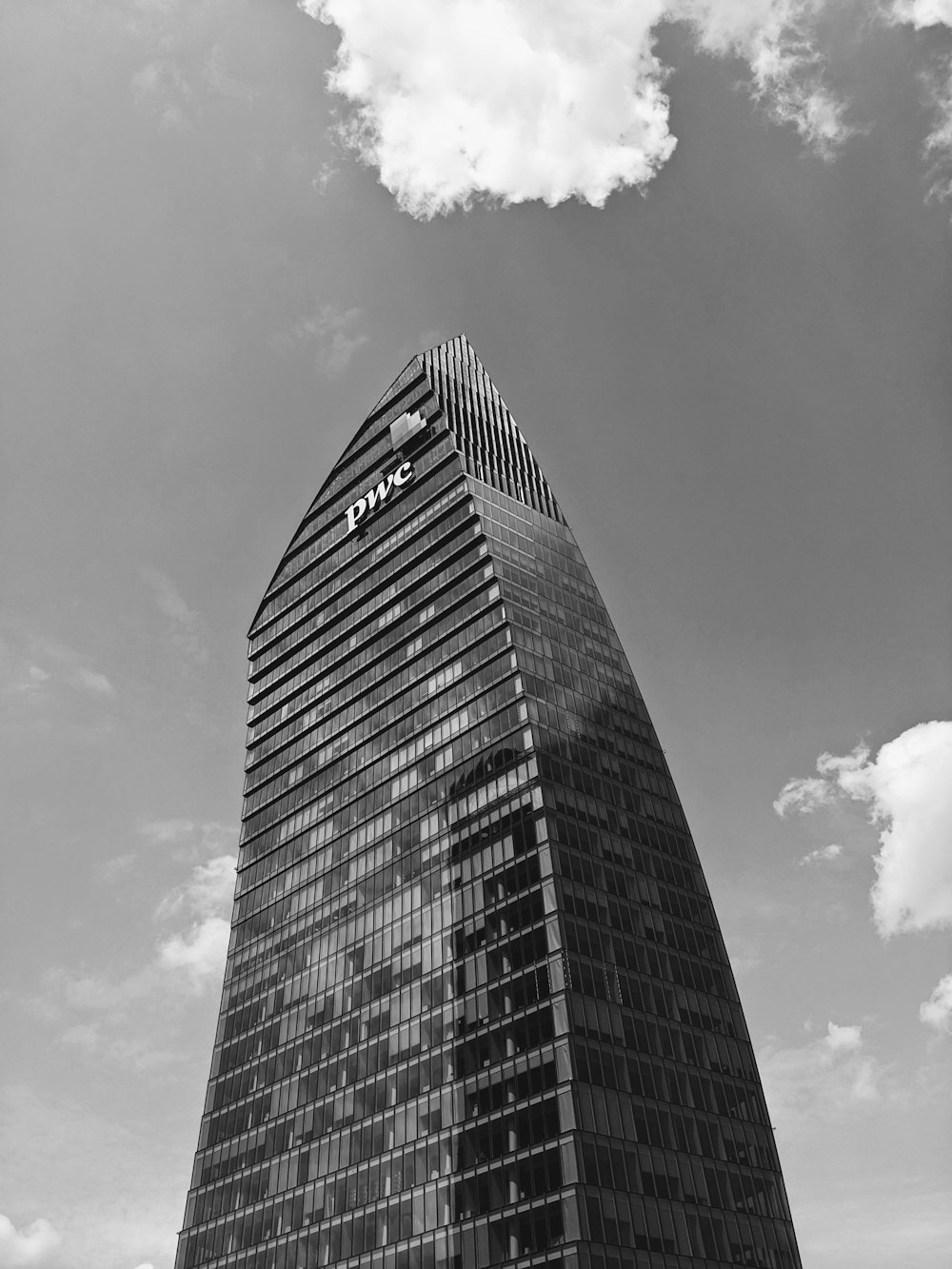 a black and white photo of a tall building