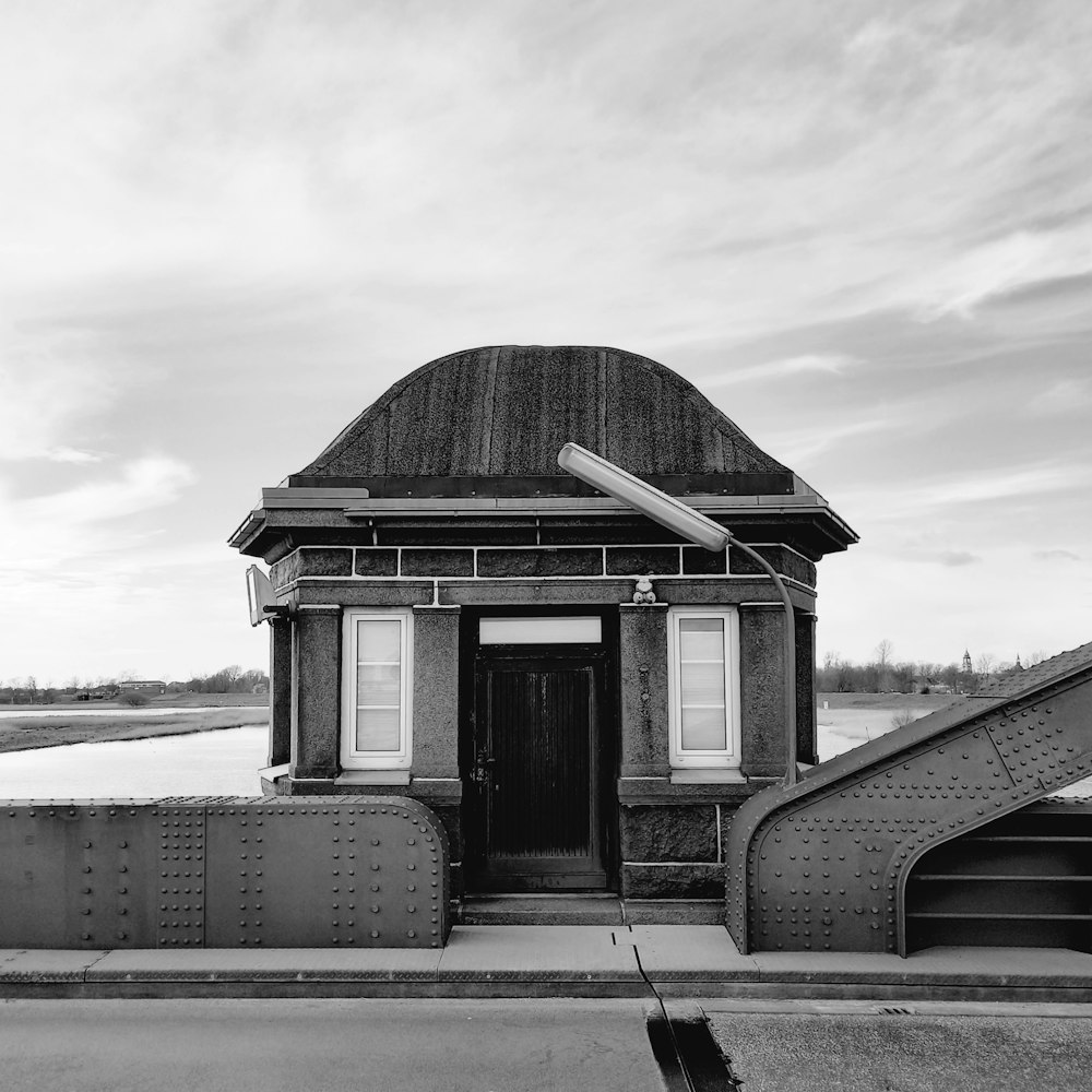 a black and white photo of a train station