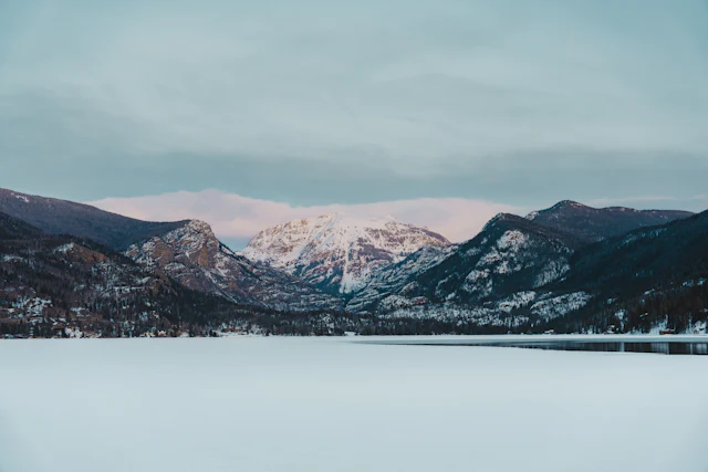 Grand Lake in winter — the peaks reflected in still water