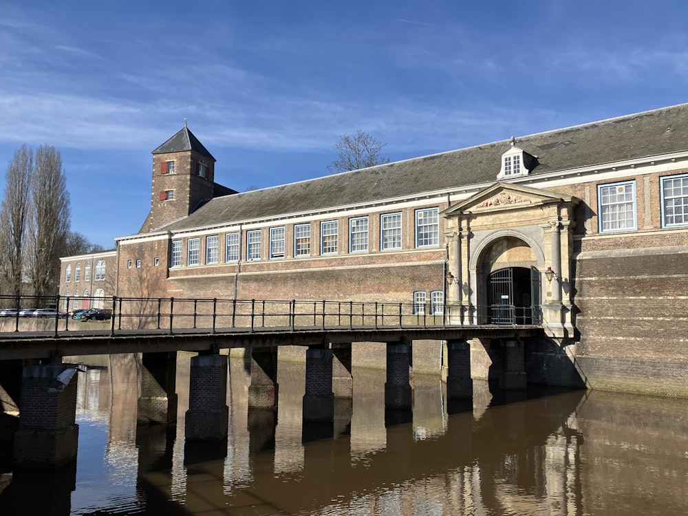 a building with a bridge over a body of water