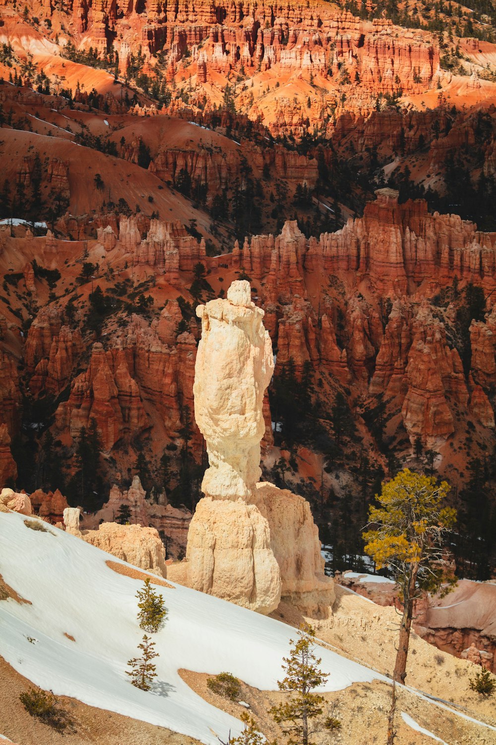 a large rock formation in the middle of a mountain