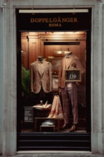 a window display of a man's suit and tie