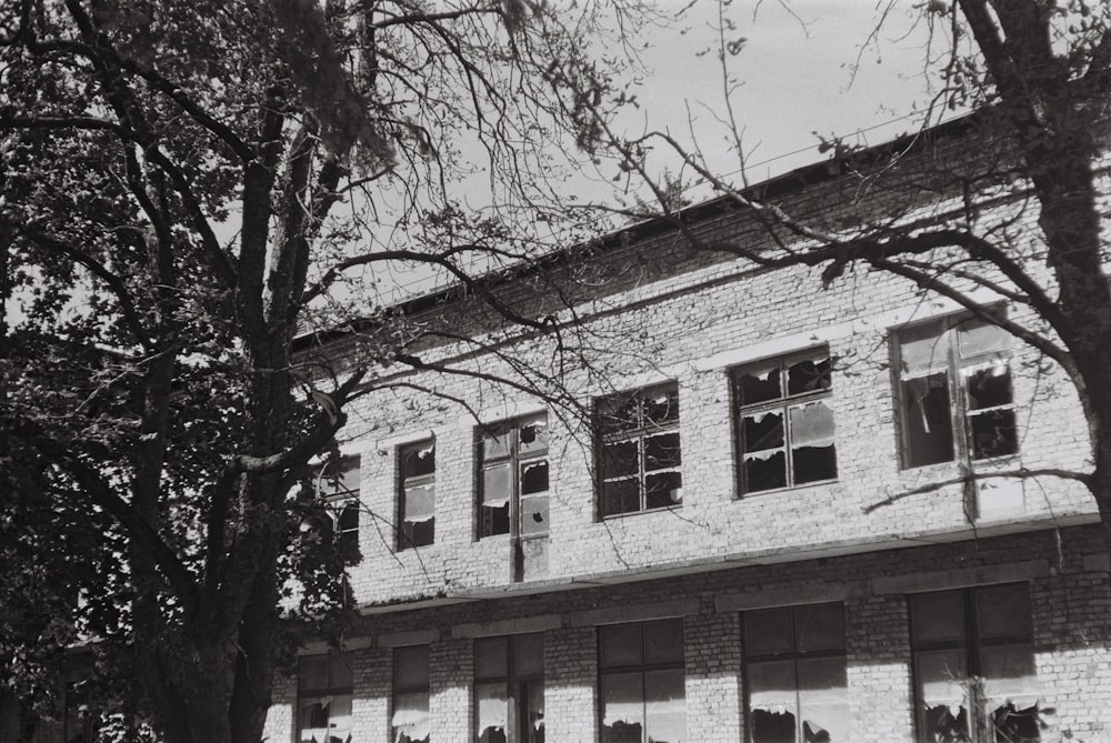 a black and white photo of a brick building