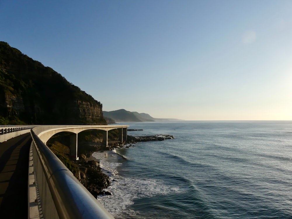 a view of the ocean from a highway