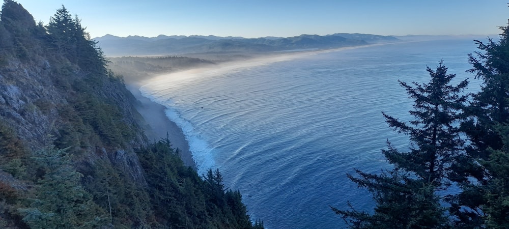 a view of the ocean from the top of a mountain