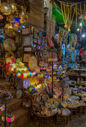 a market with lots of colorful lights and decorations