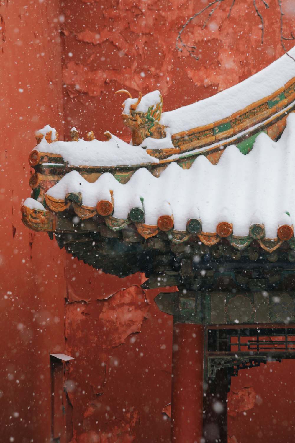 a building with a roof covered in snow