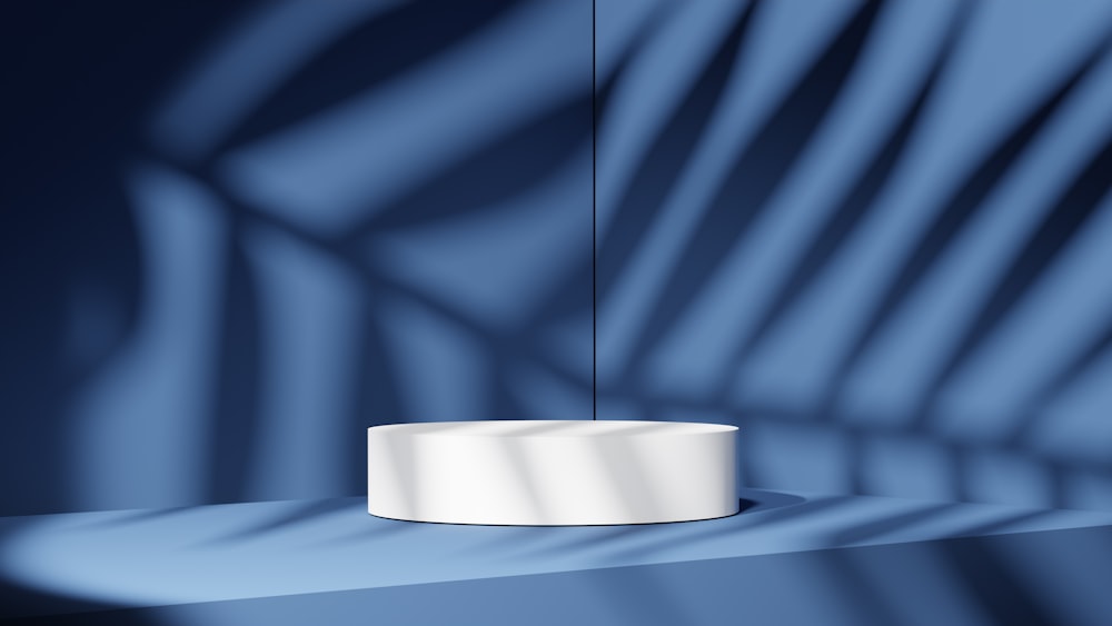 a white round object sitting on top of a table