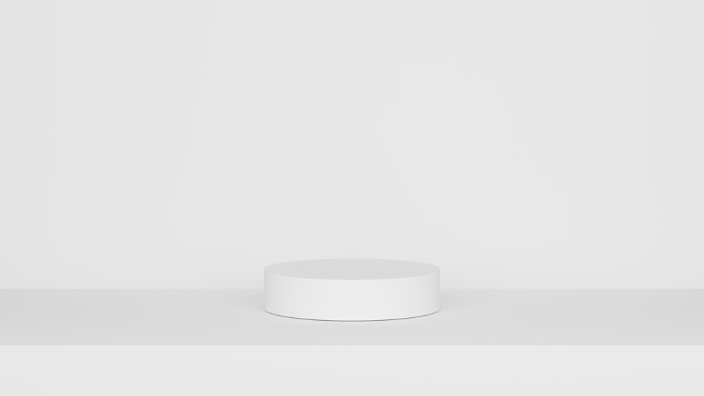 a white object is sitting on a shelf