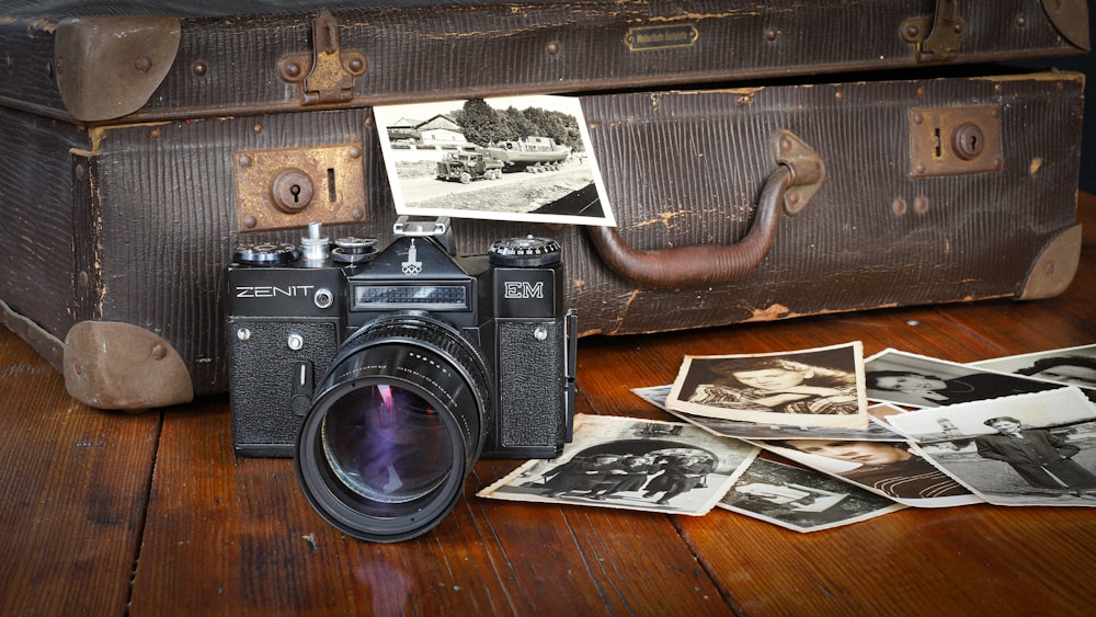 a camera sitting on top of a wooden table