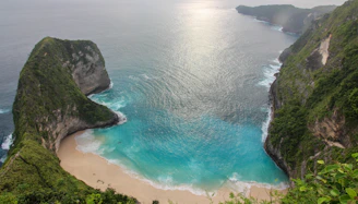a view of the ocean from the top of a mountain
