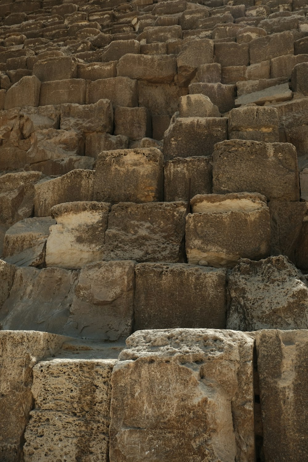 a large group of rocks sitting next to each other