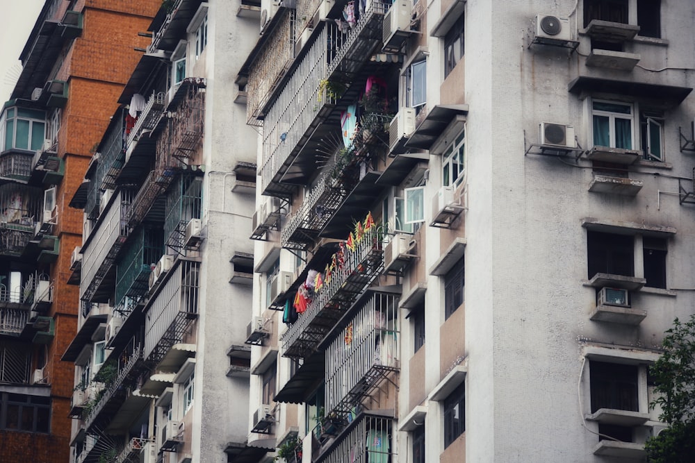 a very tall building with lots of balconies