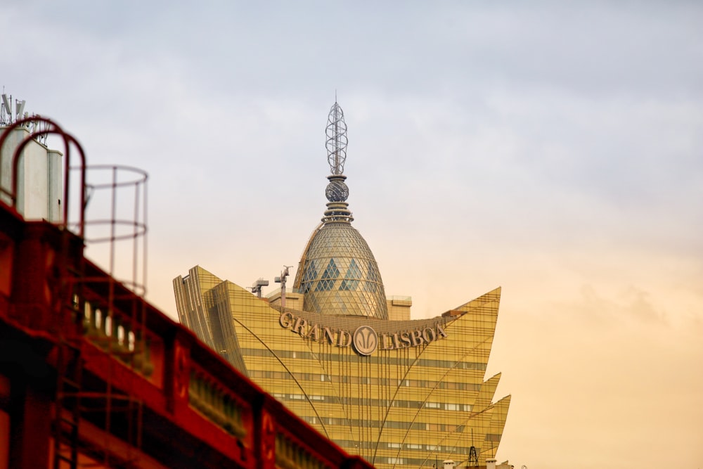 a very tall building with a clock on it's side