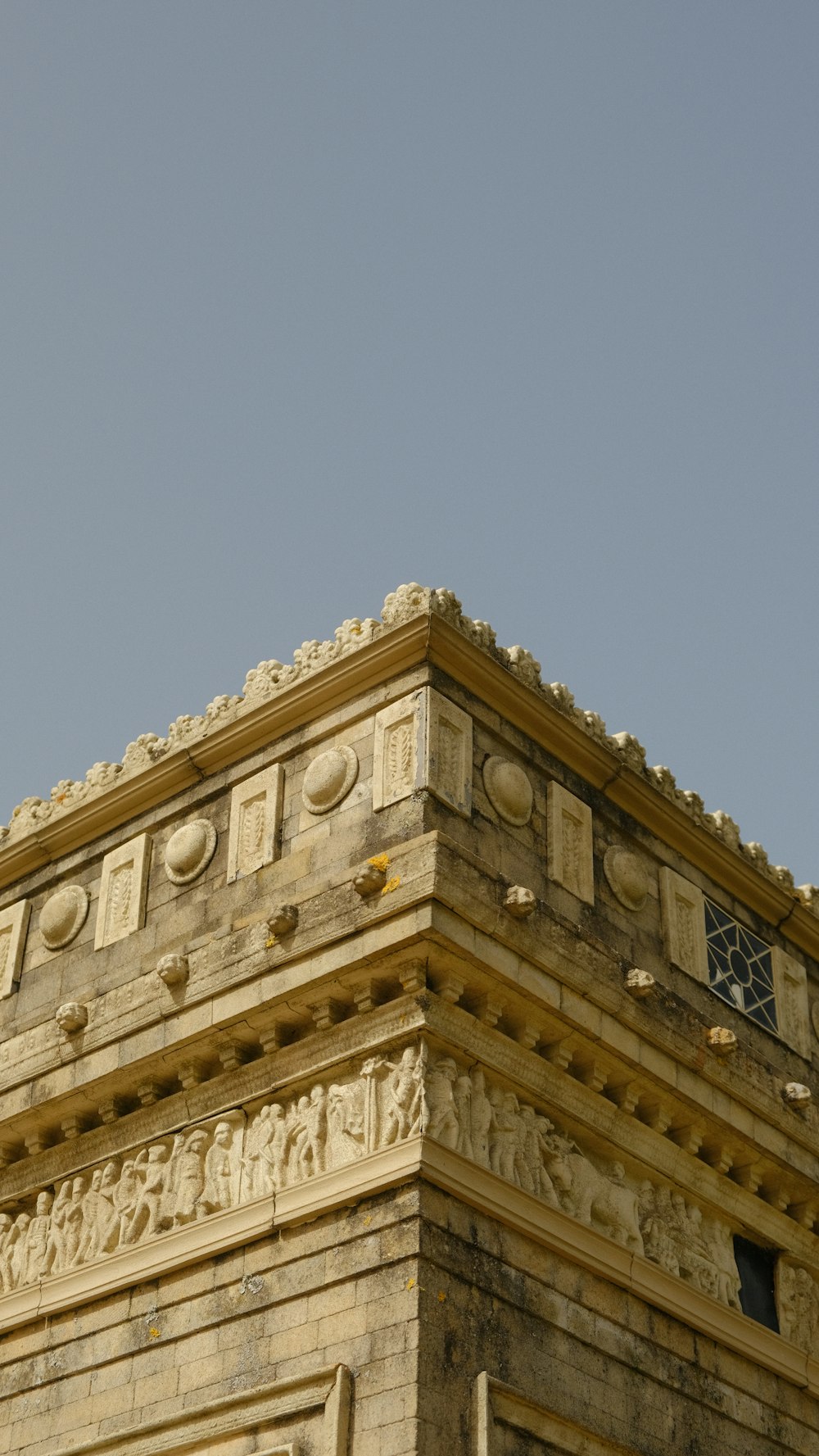 a tall building with a clock on the top of it