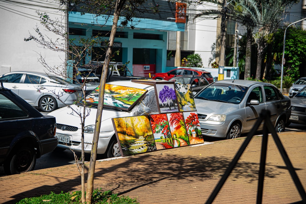 a street scene with cars parked on the side of the road