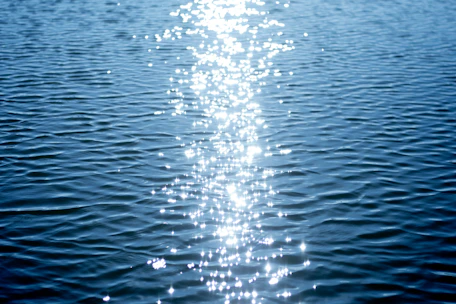 a long line of water with a sky background