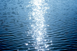 a long line of water with a sky background