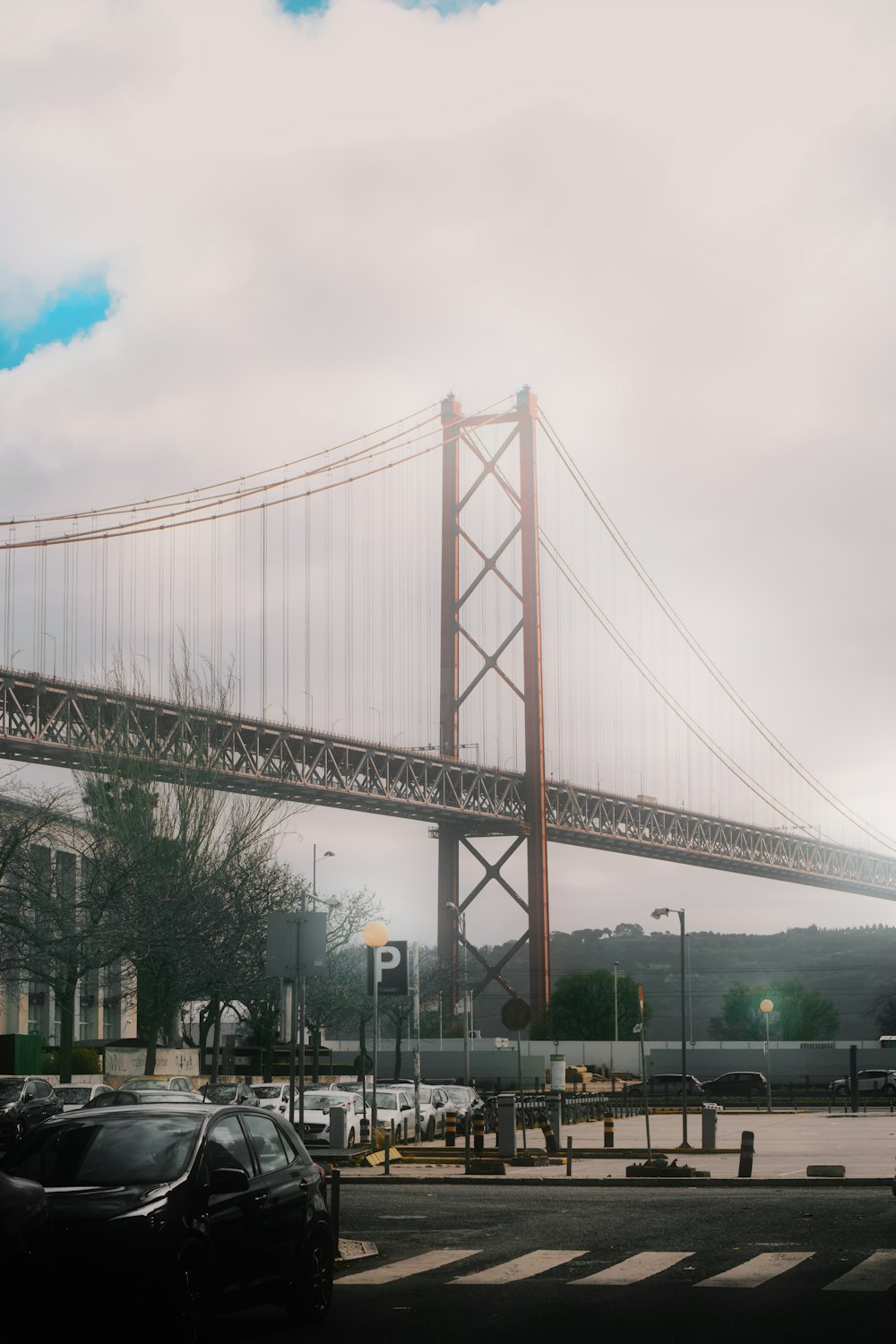 a view of a bridge from a parking lot