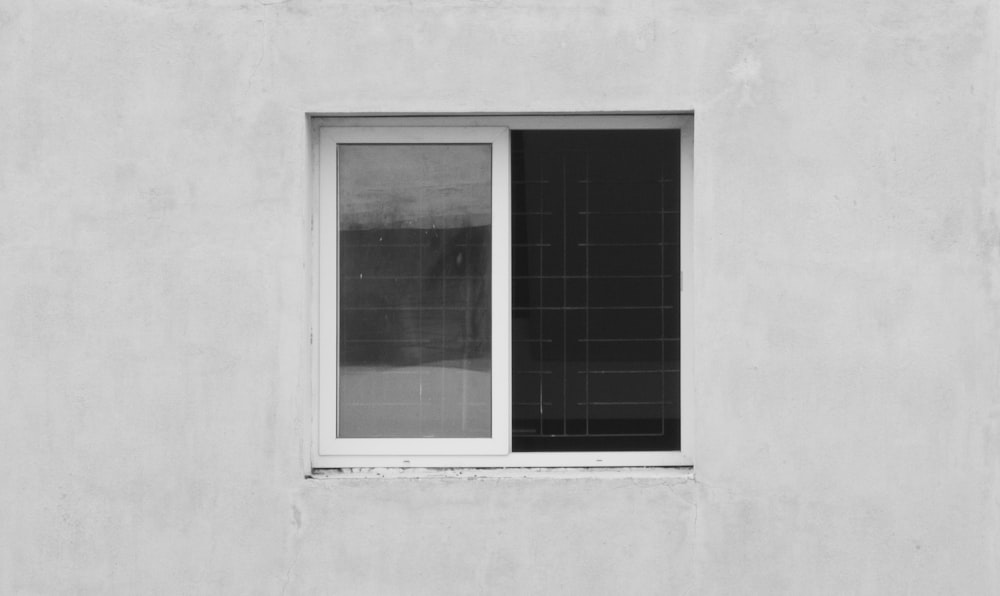 a black and white photo of a window