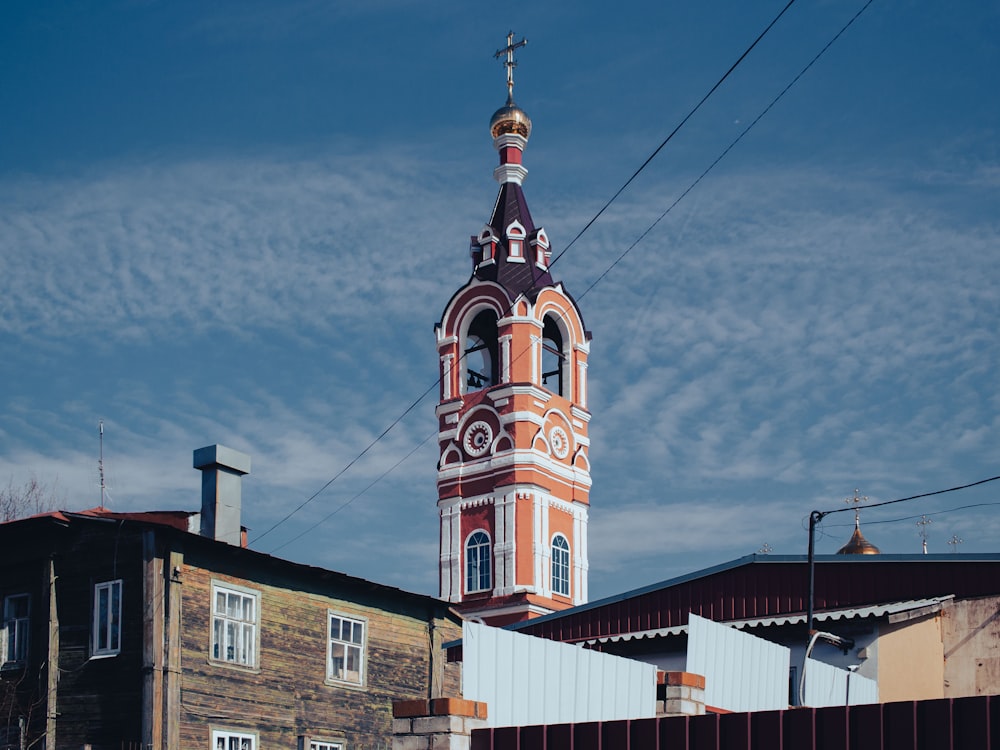 a tall tower with a clock on top of it