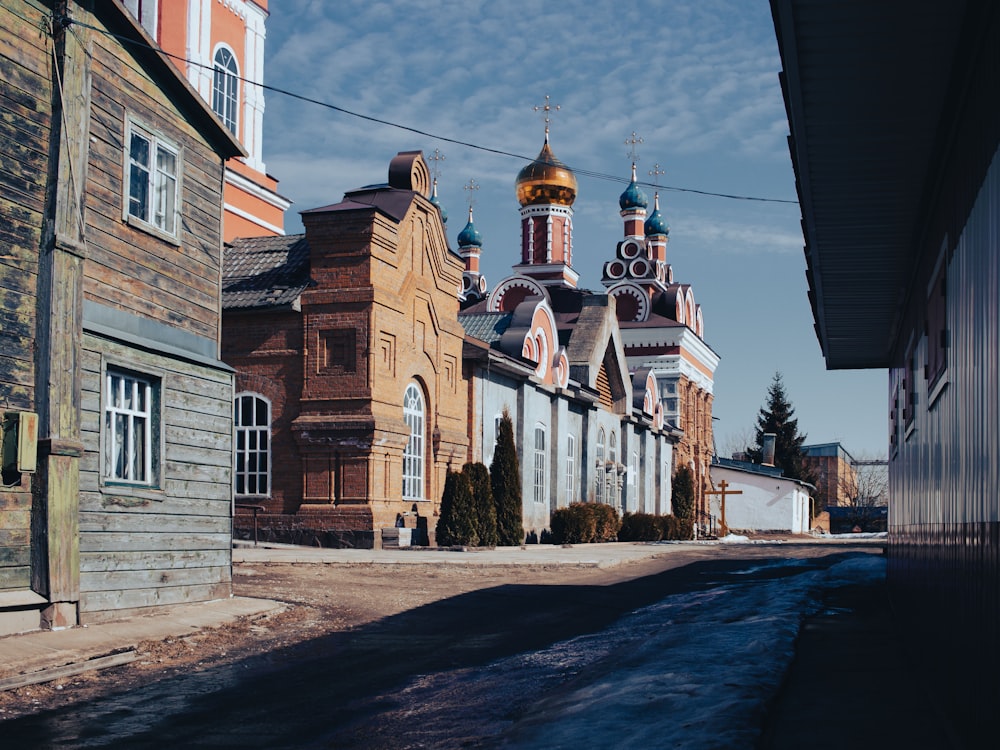 a street with a church in the background