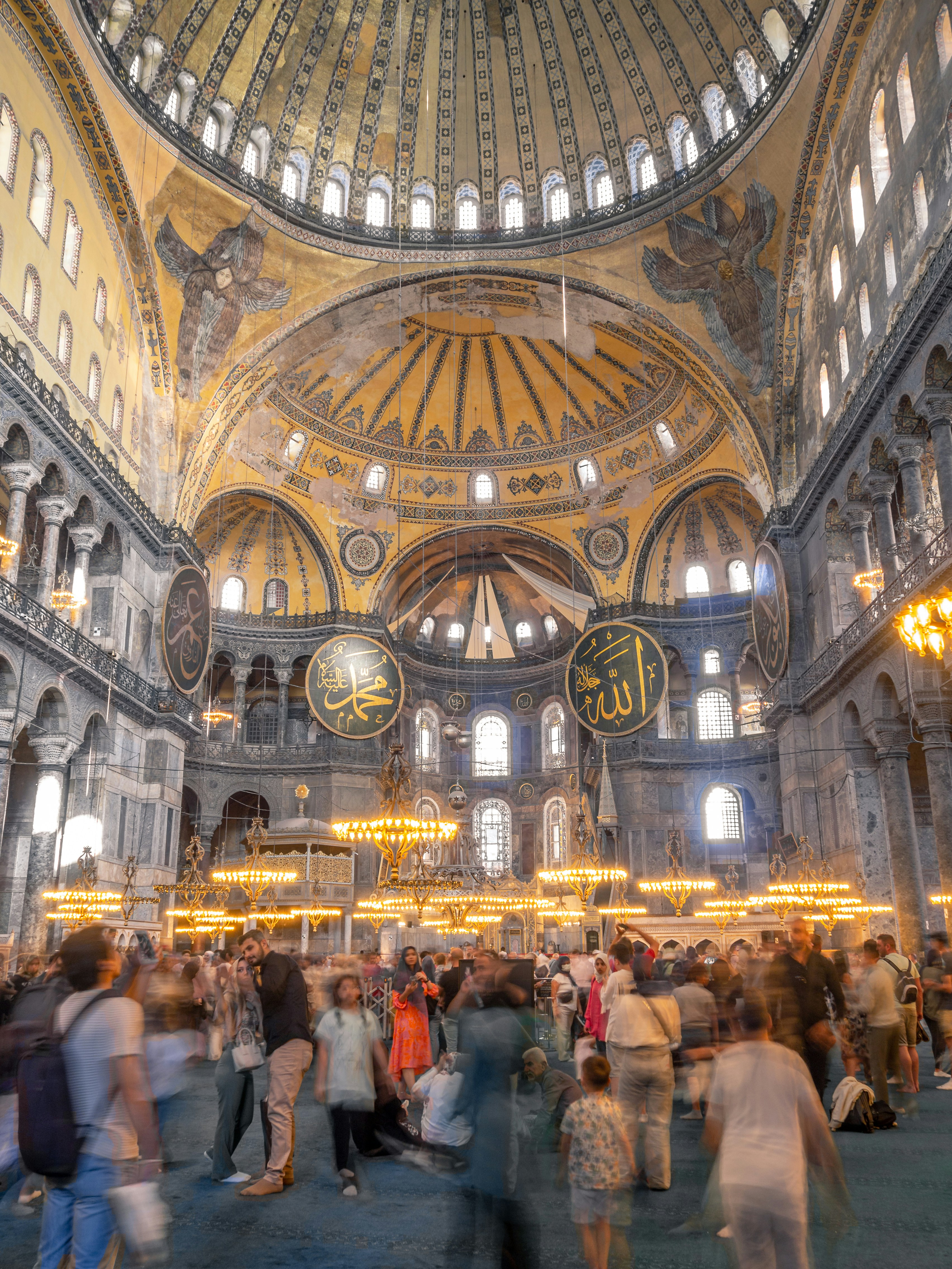 a large group of people inside of a building