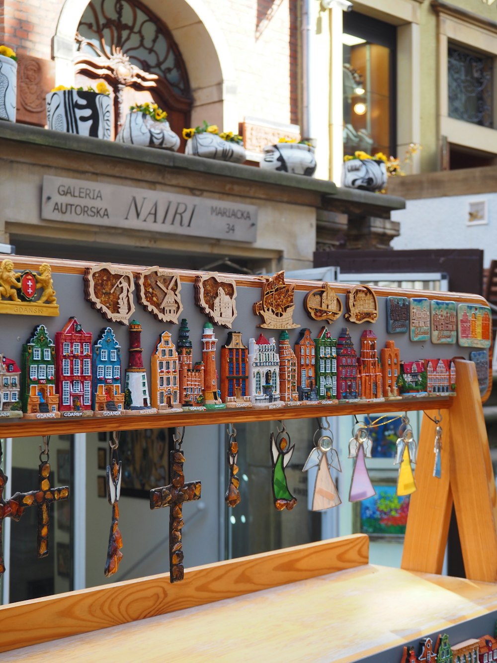 a display in a store filled with lots of wooden ornaments